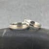 Alianzas de boda en plata y oro 14k sintetizado · Diagonal